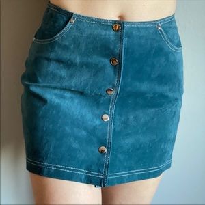 Button down blue real leather skirt.